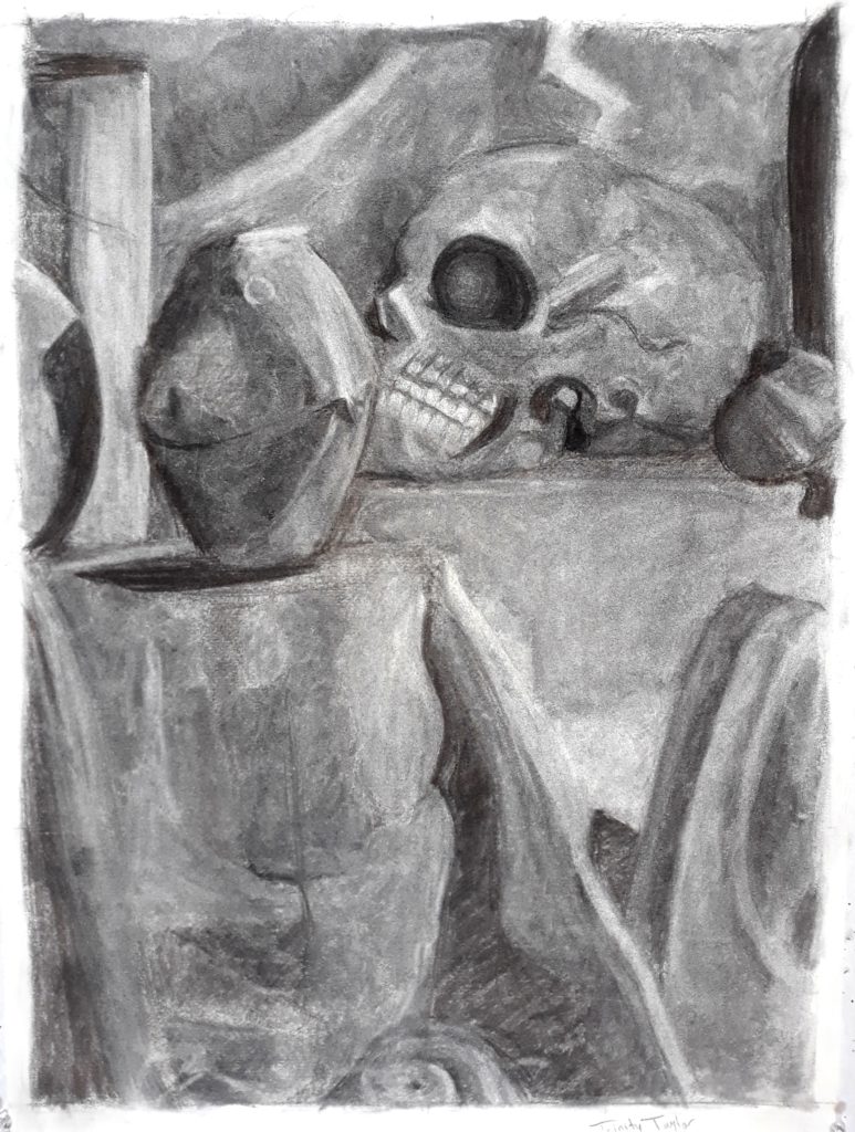 Everything in this image was white, but the image itself is a reductive value drawing completed with vine charcoal. The objects in the still life sat on boxes covered in white sheets background.

Beginning from the left, there is a styrofoam sphere that peeks out from the left side of the page slightly behind it and to the right stands a bare, white paper towel roll. A can to the right of the paper towel roll casts a dark shadow on the styrofoam ball. All three objects sit on a ledge draped in a sheet, which wrinkles up slightly as gravity pulls it toward the bottom of the page. The ledge covered in the drape takes up the bottom left quarter of the page.

Slightly behind and to the right of the can is a skull, facing the left side. The end of a bone can be seen peeking out next the skull, slightly in front of a black wine bottle. The bone, shifted a bit off of the second ledge casts a small, dark shadow on the drape below. Underneath these objects and next to the first drape there is a slab of rock, like worn marble with a design engraved in it, although the engraving cannot be seen, only the faint shadows cast from it onto the marble. The corner of a box pokes out from behind the slab, the side nearest the viewer covered in a dark shadow.

At the very bottom of the page, at the edge of the first ledge, lies a small hermit crab shell.