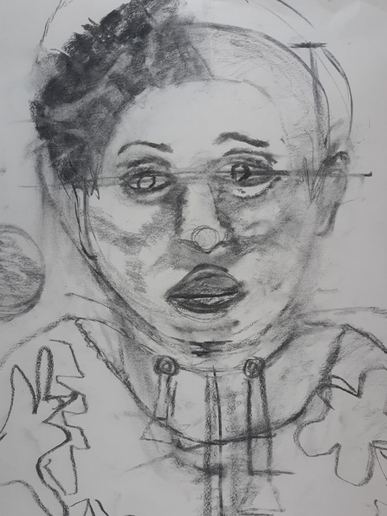 charcoal sketch drawing of a face