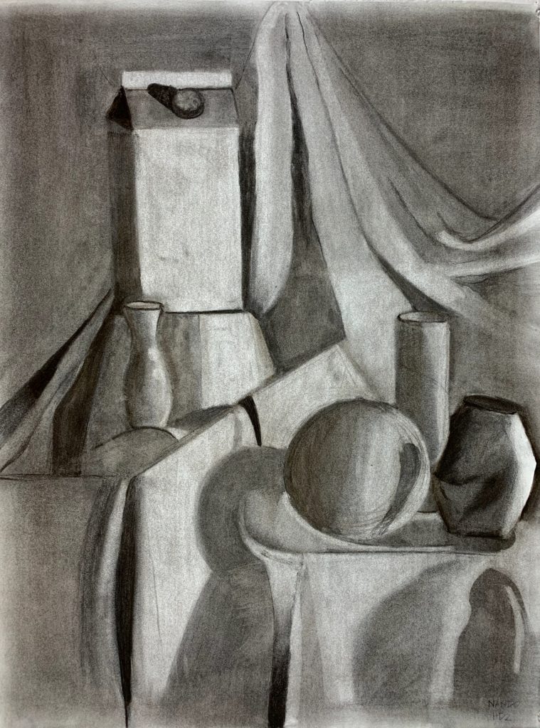 Two pedestals with a variety of objects on them. There is a milk carton on the left hand side and a crushed up soda can on the right hand side. In the middle there are basic shapes such as a cube, a sphere, and a cylinder. In the background there is a curtain draping  on both sides. 