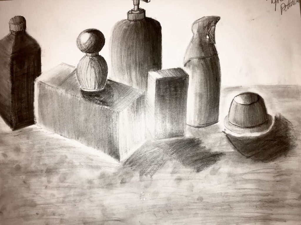 This is anther charcoal drawing. I went int my girlfriend's dorm and took its she had on her dresser and drew them. I took lotion, air freshener, apple sauce, peroxide, and her perfumes. I made a still life drawing from these items. 